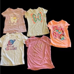 5 girls t-shirts. Size 8/8 The pink one has a gold unicorn on it.